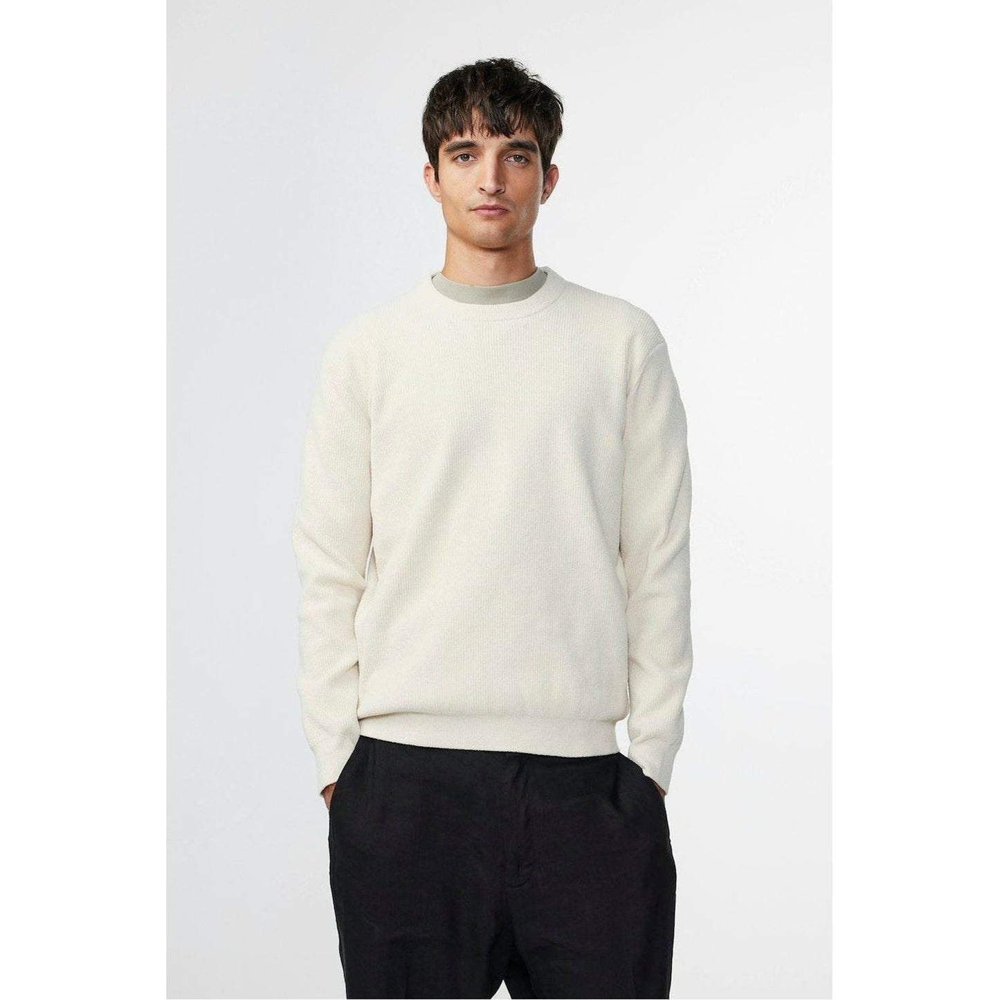 Men's NN07 Danny Sweater in ecru, featuring a cozy knit fabric and classic crewneck design, shown on a model.