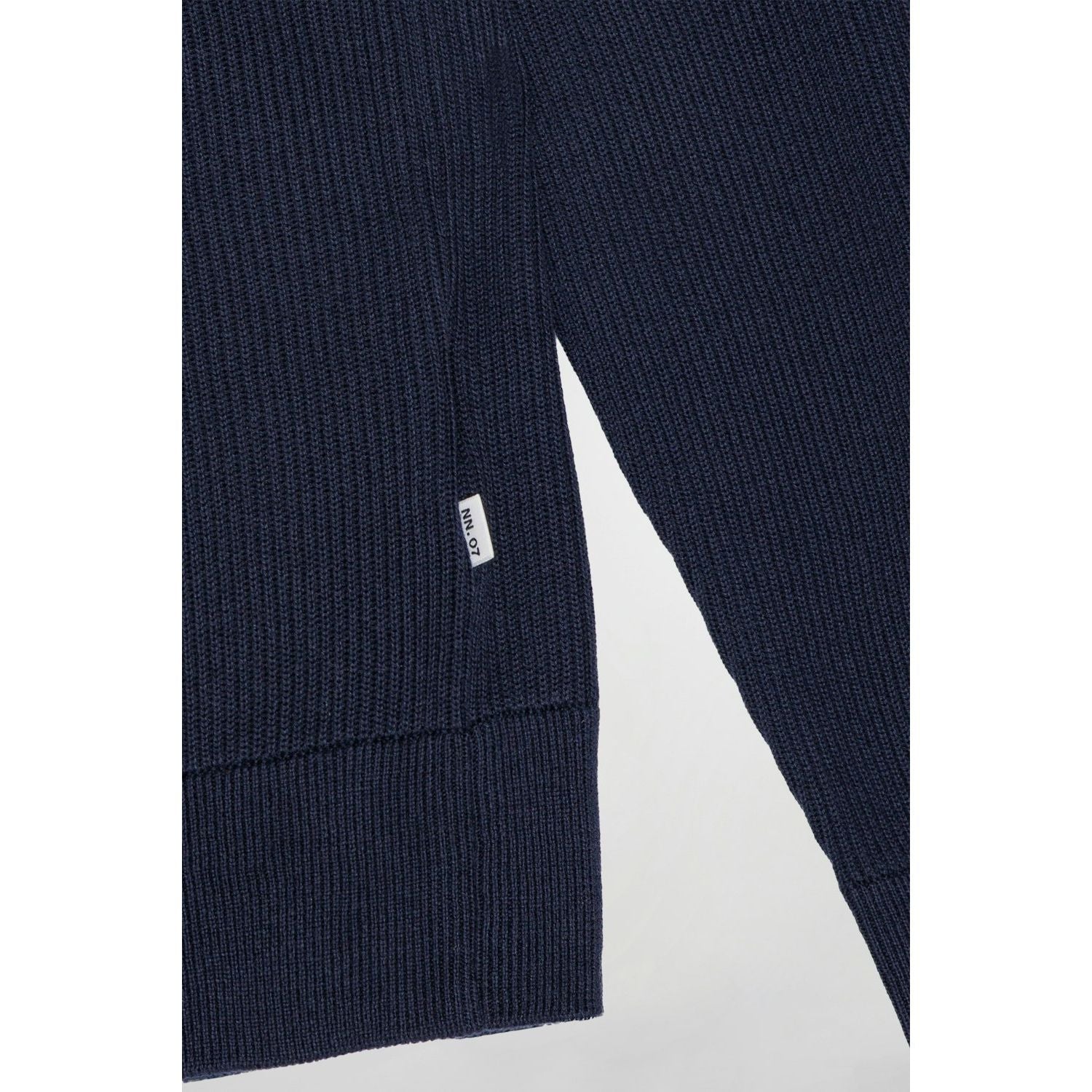 Men's navy Kevin ribbed organic cotton sweater by NN07, showing the textured ribbed knit fabric and classic fit.