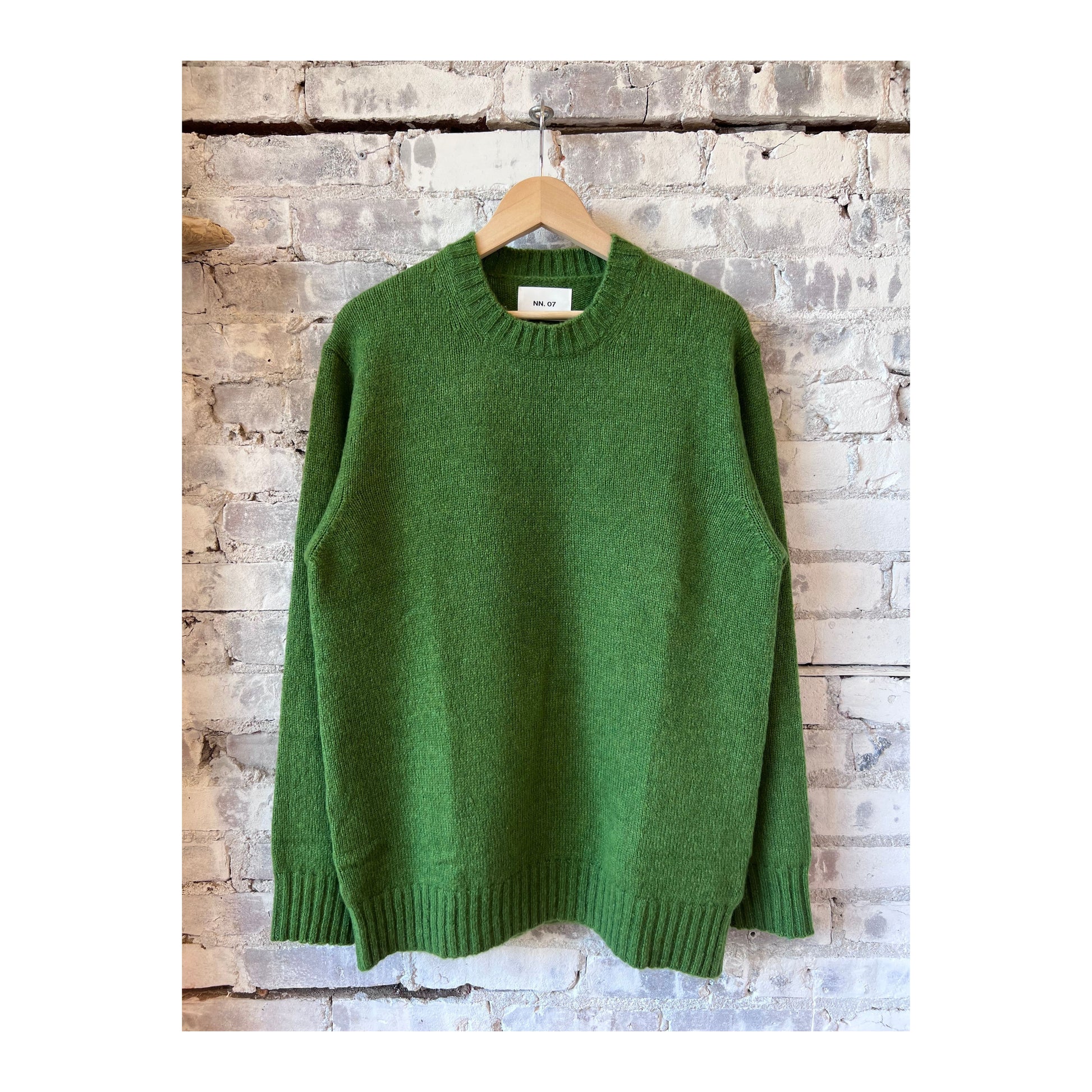 Men's Lee Wool Blend Sweater in Kale by NN07, showcasing a close-up of the cozy, textured knit fabric and stylish fit.
