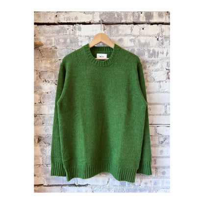 Men's Lee Wool Blend Sweater in Kale by NN07, showcasing a close-up of the cozy, textured knit fabric and stylish fit.