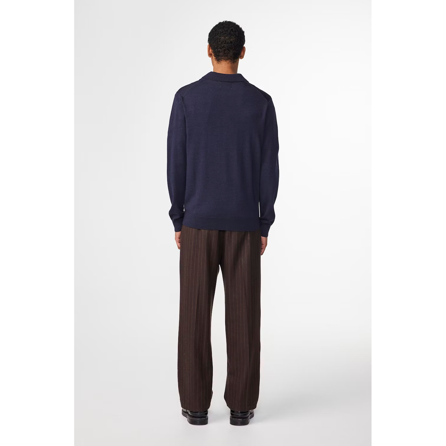 Men's navy multi Sergio Zip Mock polo shirt by NN07, featuring a zip collar and stylish design, shown on a model.