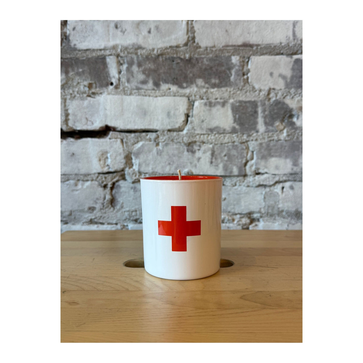 Nordic Wellness™ Vitamin C Candle accessory by Kalastyle Soap Co., featuring a natural soy wax candle with a vibrant orange hue.