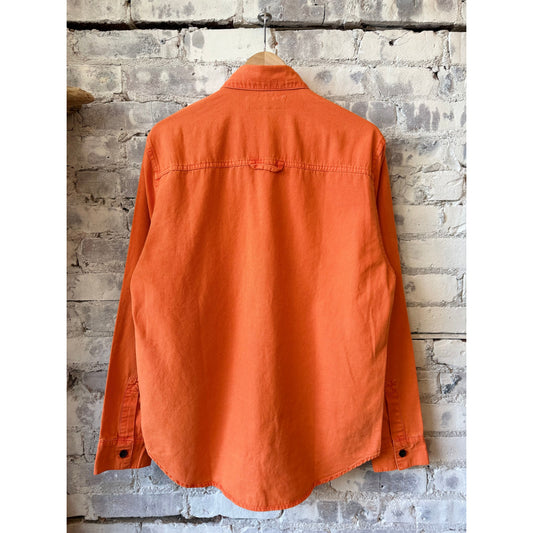 Men's Nova Canvas Shirt in Cheddar by Big Rock Candy Mountaineering, shown in a close-up image highlighting the fabric and color.