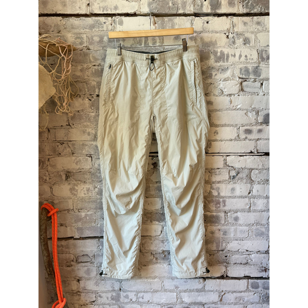 Men's Relwen Off-Trail Windpant in chalk, lightweight outdoor pants with wind-resistant fabric and relaxed fit.