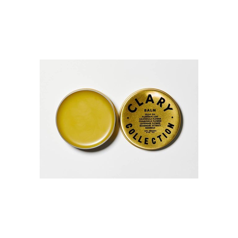 Clary Collection Olive Balm 2oz jar, a natural skincare accessory with a black lid and green label, close-up view.