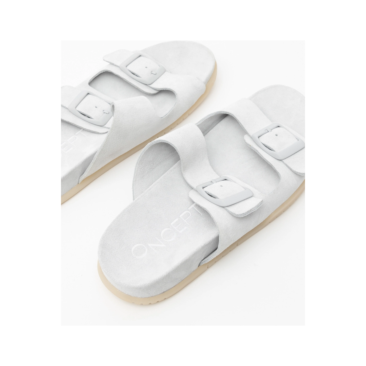 Women's Savannah Hydro-Suede Slide in Ice by Oncept, water-repellent sandal with contoured footbed for comfortable wear.