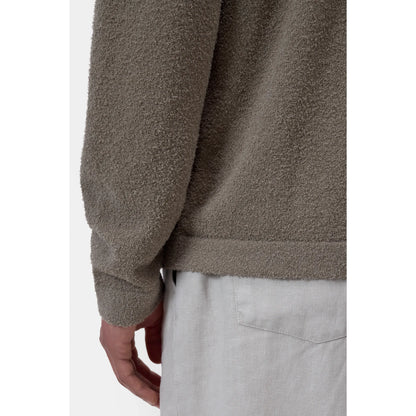 Men's organic cotton cardigan in pebble green by Closed Men's, featuring a soft, cozy knit with a button-up front and ribbed cuffs.