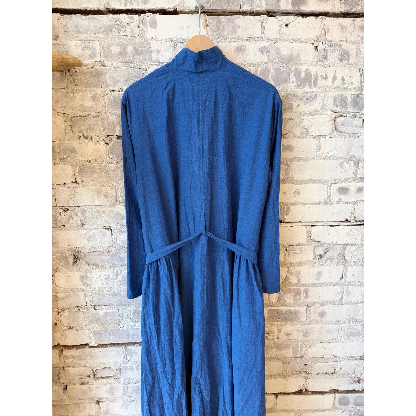 Women's organic cotton chambray dress in cobalt by Pas De Calais, featuring a relaxed fit and button-front design.