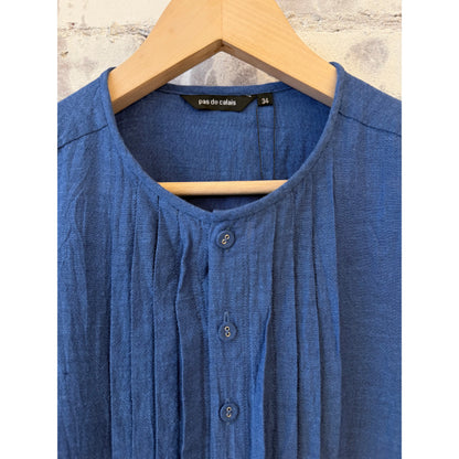 Women's organic cotton pleated blouse in cobalt by Pas De Calais, featuring a stylish pleated design and comfortable fit.