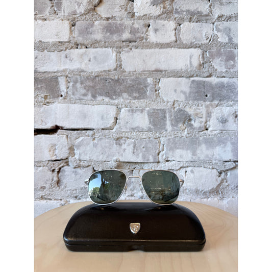Men's American Optical Original Pilot Aviator sunglasses with matte silver frames and dark tinted lenses.