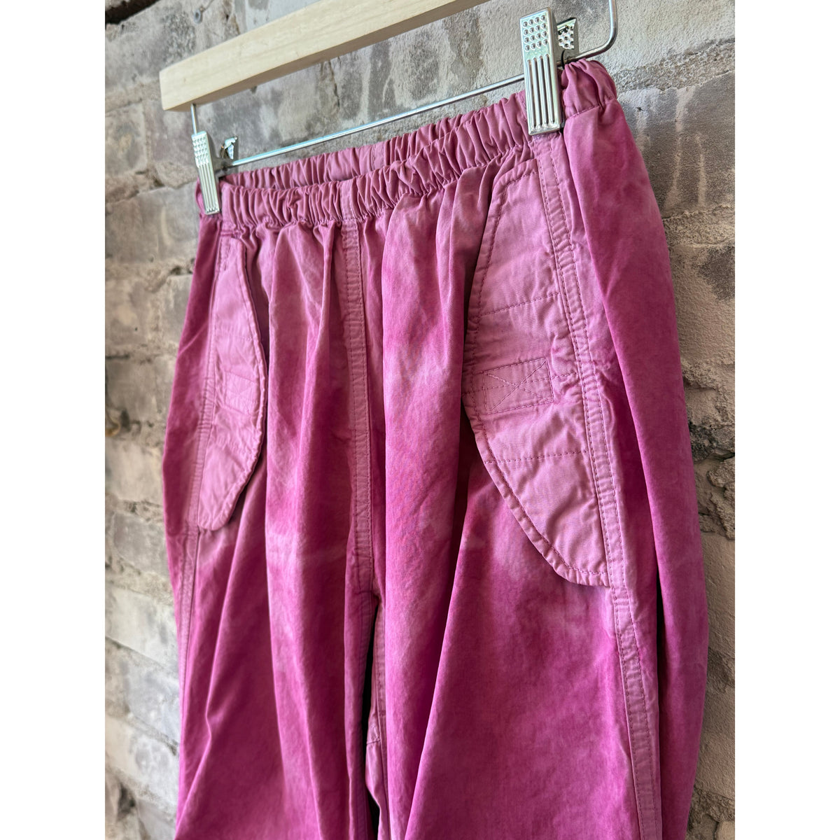 Women's pink poplin kite pant with air flap and snap closure by Freecity, featuring a relaxed fit and casual style.