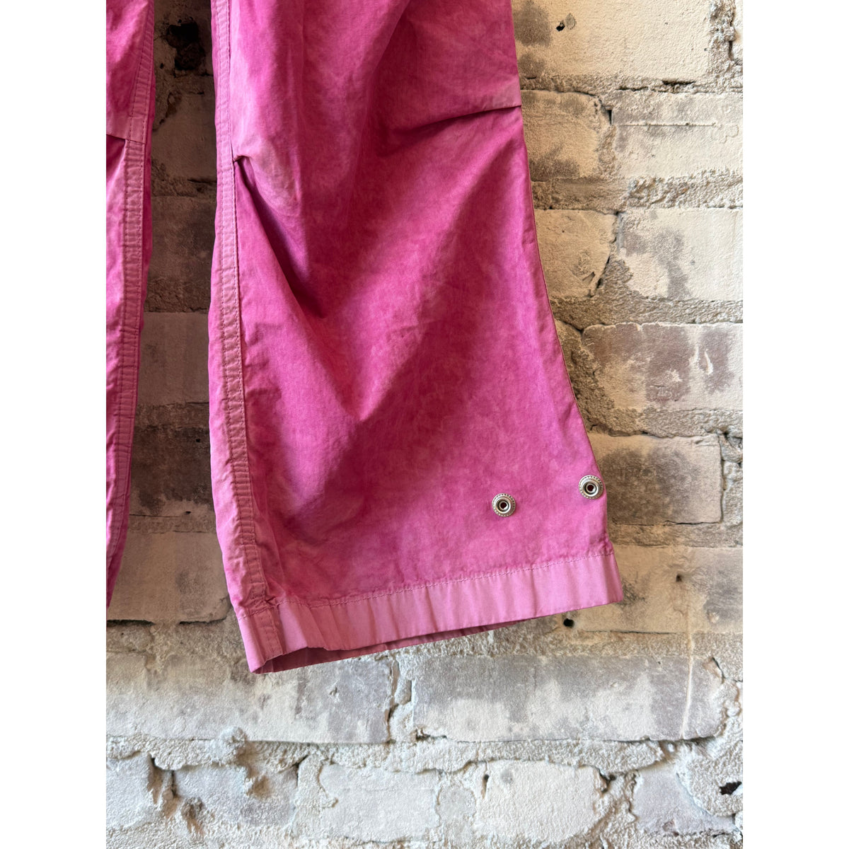 Women's pink Freecity OutOfSight Poplin Air Flap Snap Kite Pant with relaxed fit and stylish design.
