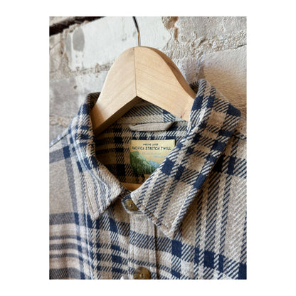 Men's Pacifica Stretch Twill Overshirt in taupe plaid fabric, featuring a classic button-up design and relaxed fit.