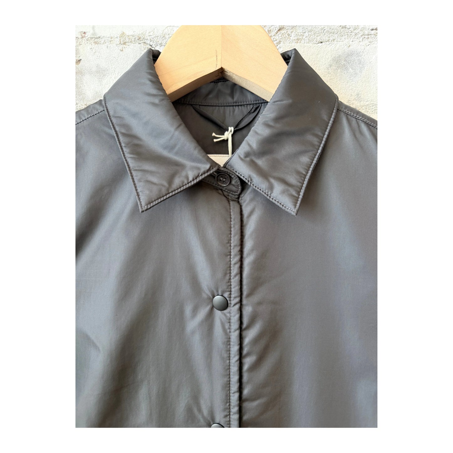 Women's grey padded nylon overshirt by Aspesi, featuring a relaxed fit and quilted design, ideal for casual layering.