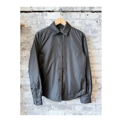 Women's grey padded nylon overshirt by Aspesi, showcasing a sleek, padded design with a casual, stylish fit.