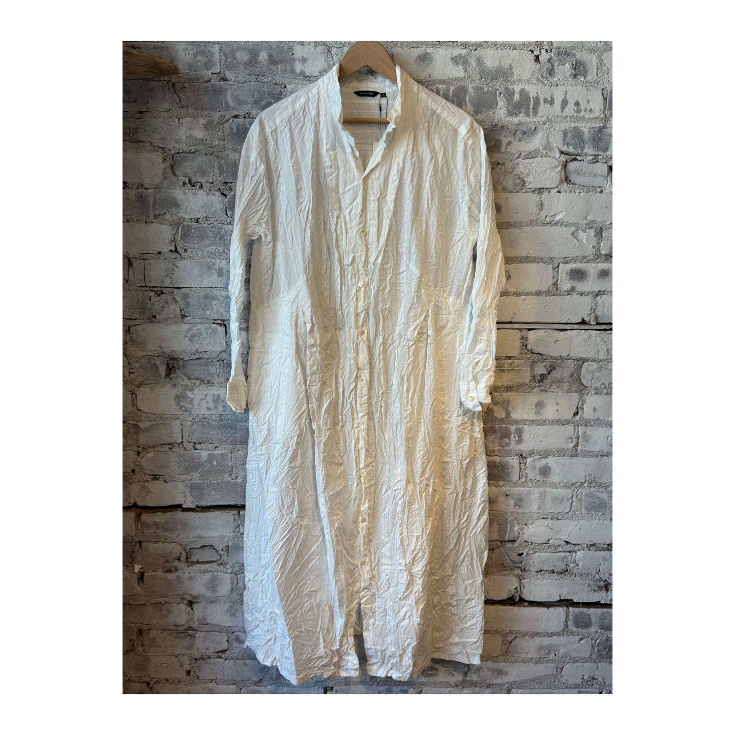 White women's Cotton Dobby Shirt Dress by Pas De Calais featuring a classic collar, button-front, and relaxed fit.