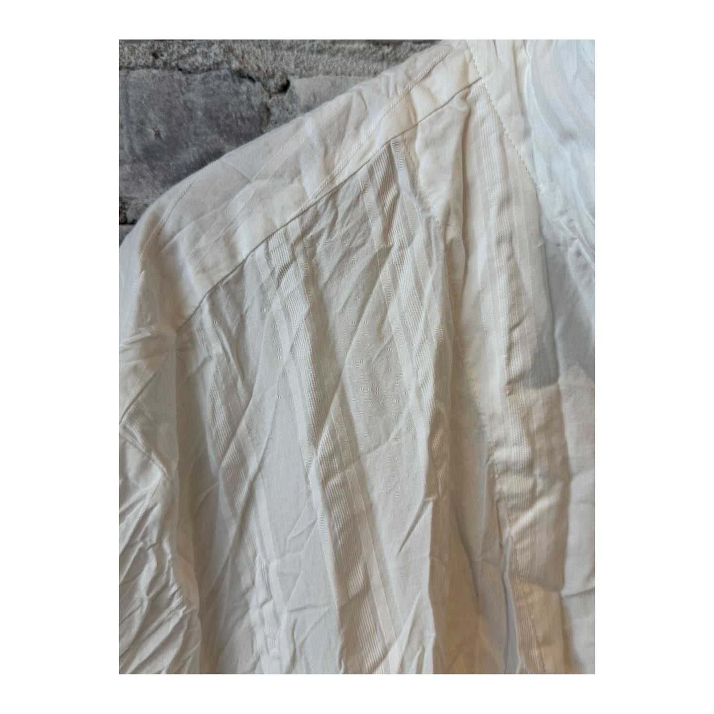 Women's white cotton dobby shirt dress by Pas De Calais, featuring a relaxed fit with button-front and classic collar details.