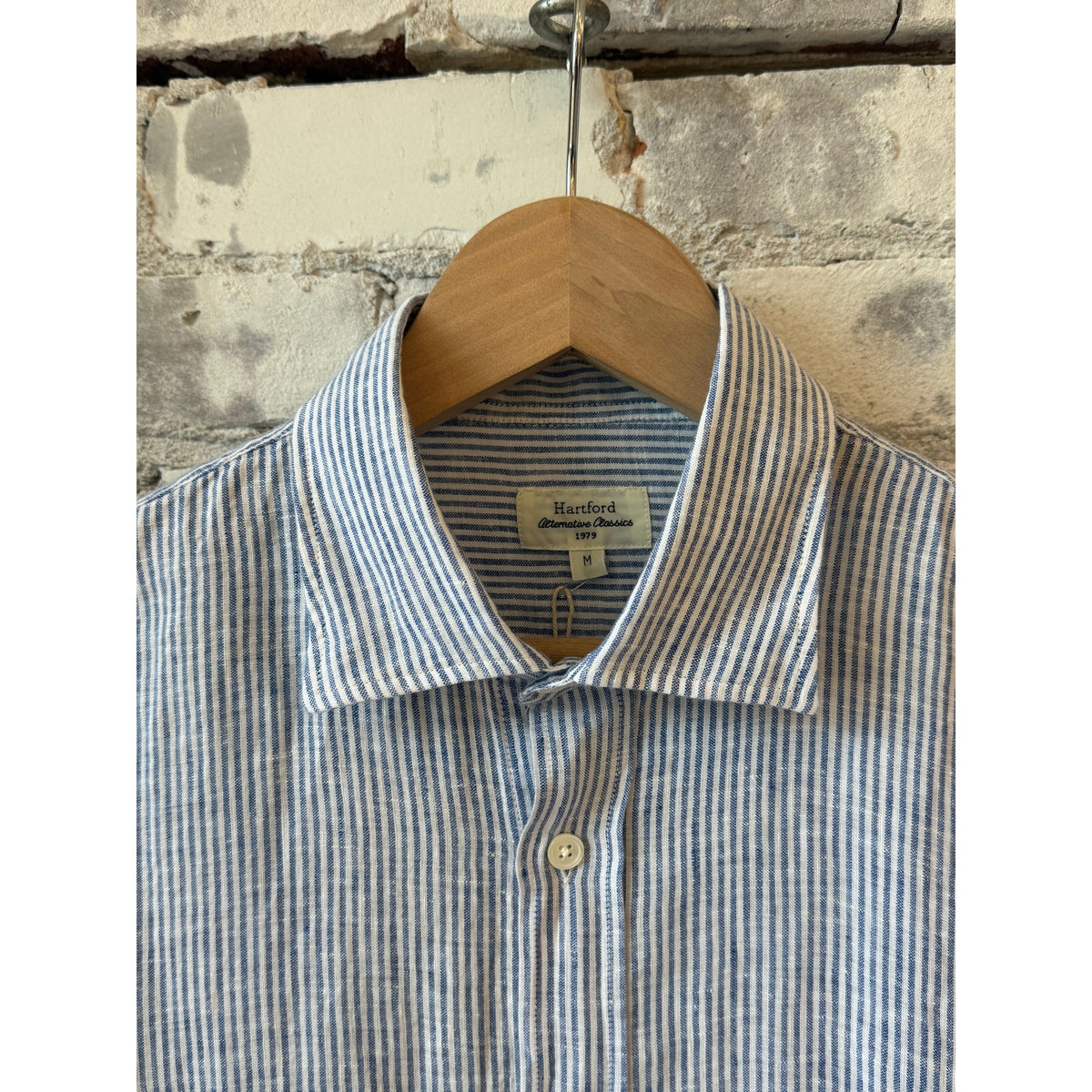 Men's navy and white woven shirt by Hartford Men's, featuring a classic Paul style, displayed on a hanger.