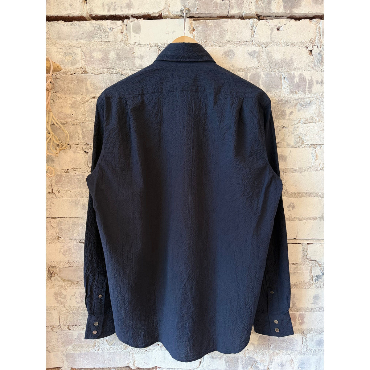 Men's navy Paul woven seersucker shirt by Hartford Men's, featuring lightweight, textured fabric and a classic button-up design.