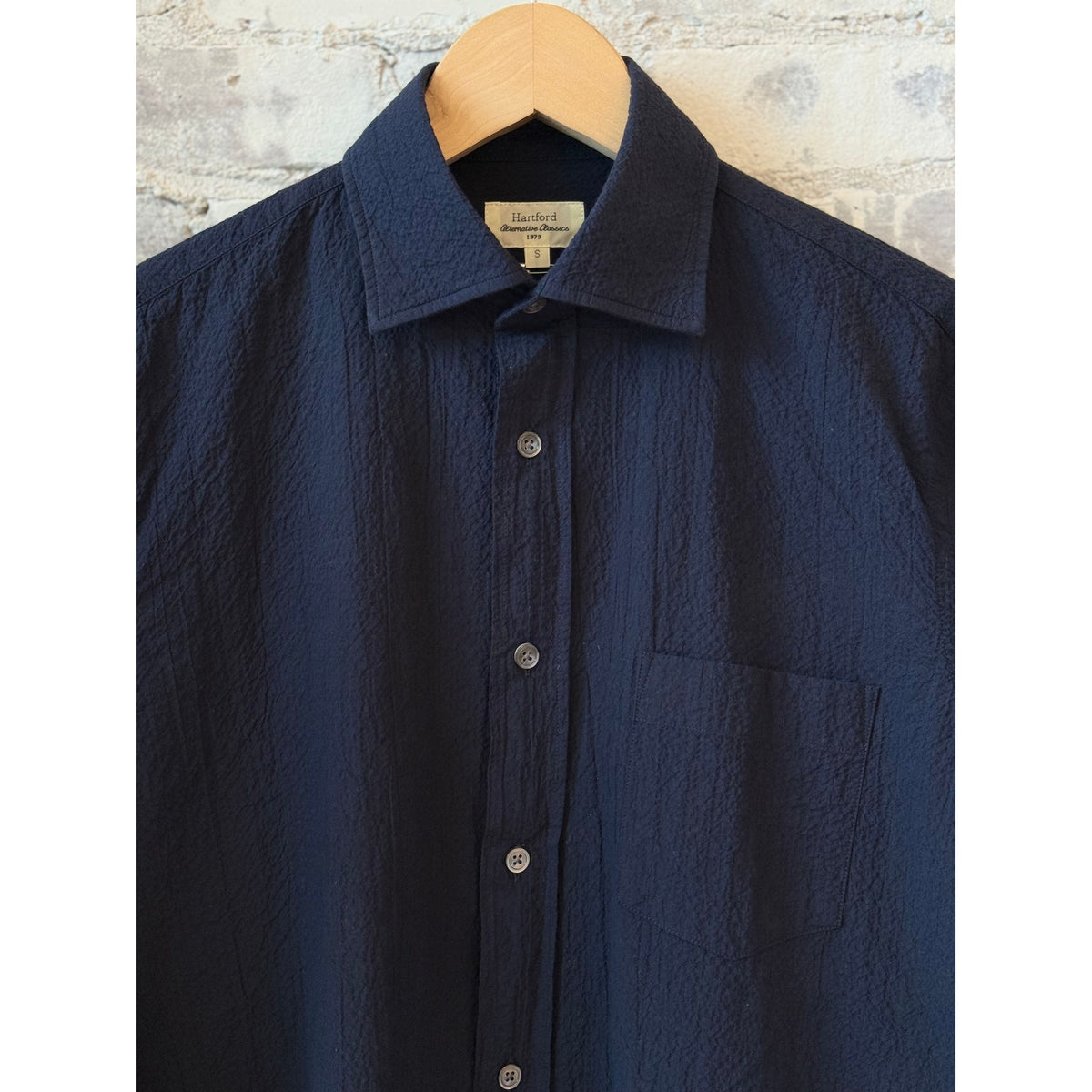 Men's Hartford Paul Woven Seersucker Shirt in navy, showing the lightweight, textured fabric and classic collar design.