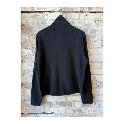 Men's navy PF jacket by 04651 with front zipper and collar, shown on a hanger against a plain background.