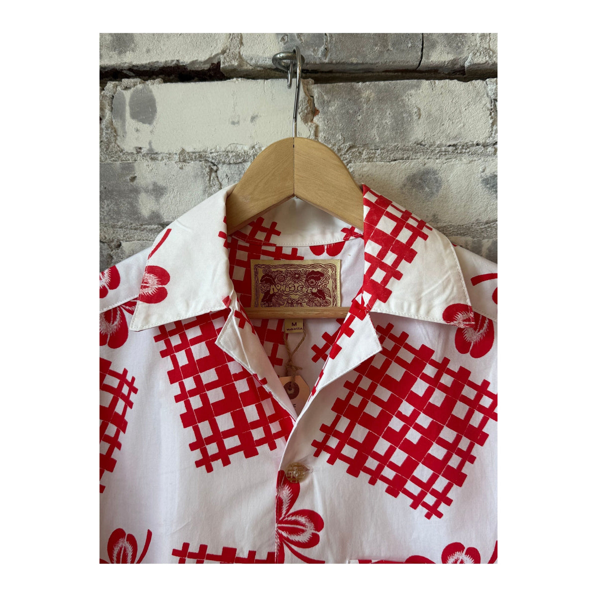 Women's red picnic cloth shirt by MONOSTERO with a casual, lightweight design and classic checkered pattern.