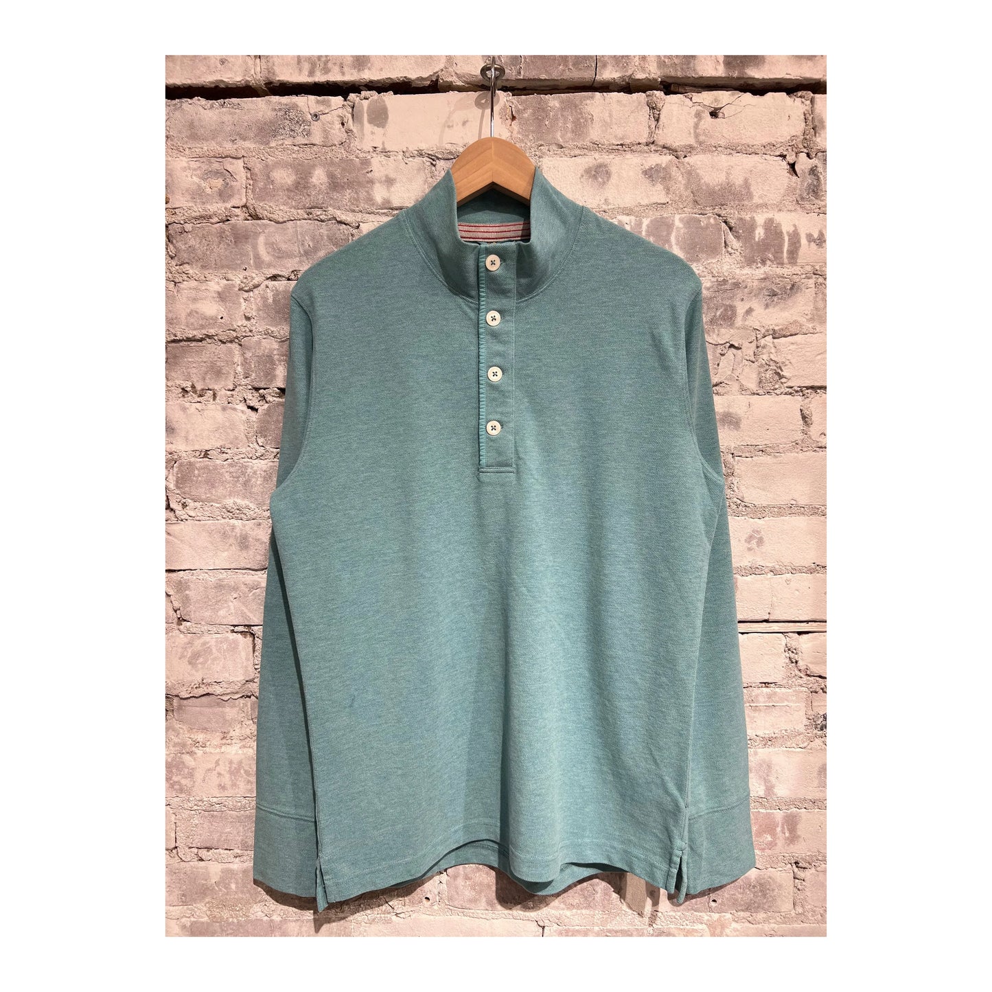 Men's Pique Button Mock in Ocean Heather by Relwen, featuring a close-up of the textured fabric and button details.