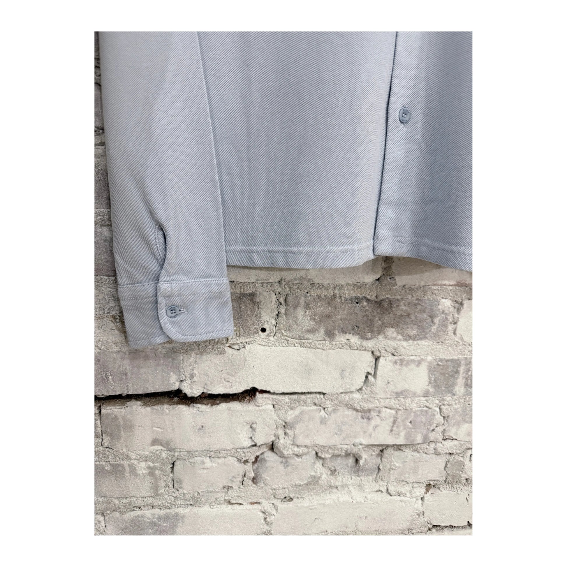 Men's Piqué Slim Collar Shirt in sky blue, featuring a classic collar and tailored fit, by 04651/.