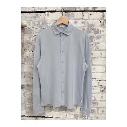 Men's Piqué Slim Collar Shirt in sky blue, branded 04651, featuring a tailored fit and classic collar detail.