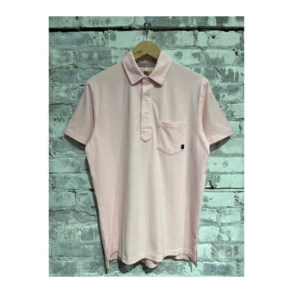 Men's pale pink Pique Slot Polo shirt by Relwen, showing the textured fabric and classic collar detail.