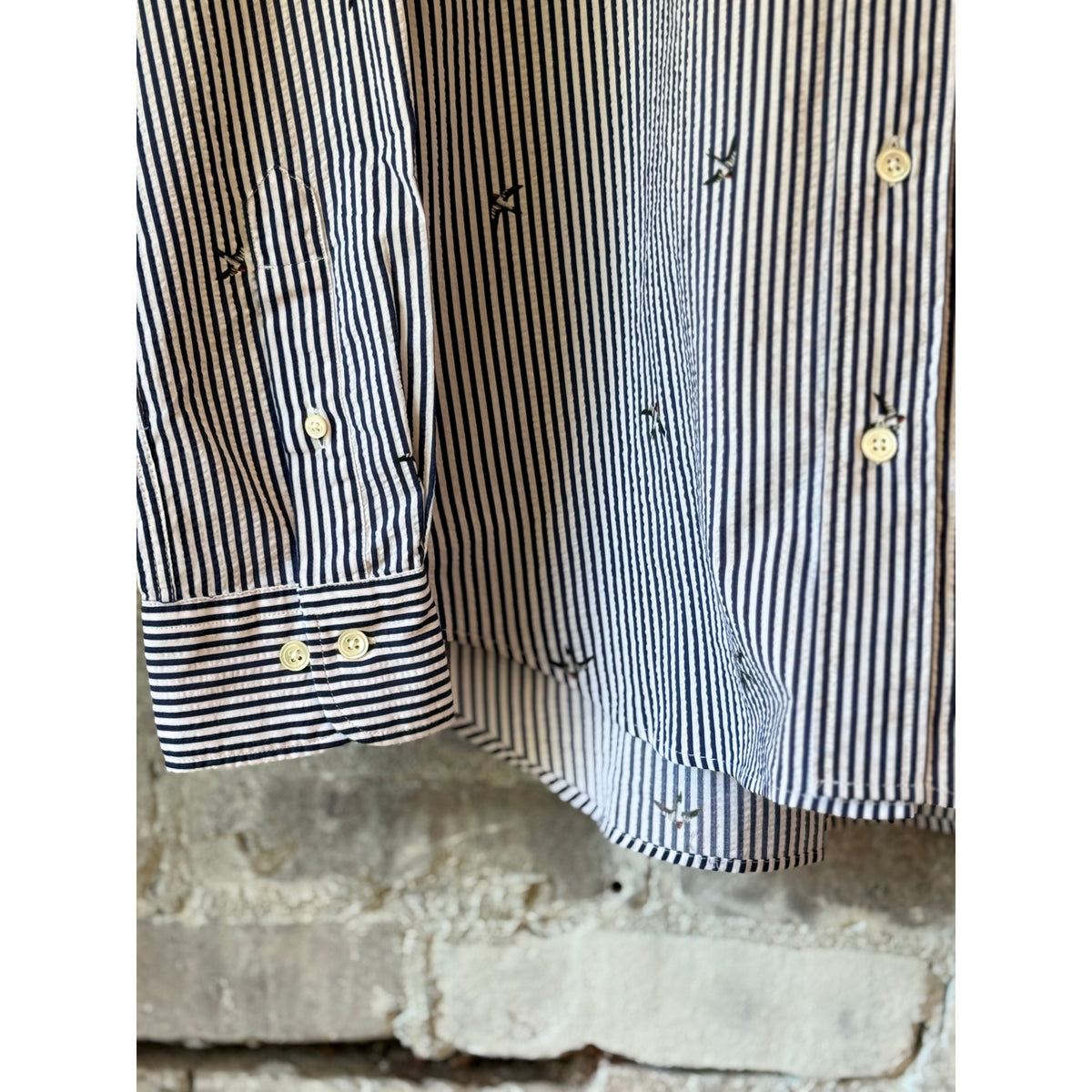 Men's Pitt Woven Shirt by Hartford Men's in navy and white with a woven pattern, displayed on a hanger.