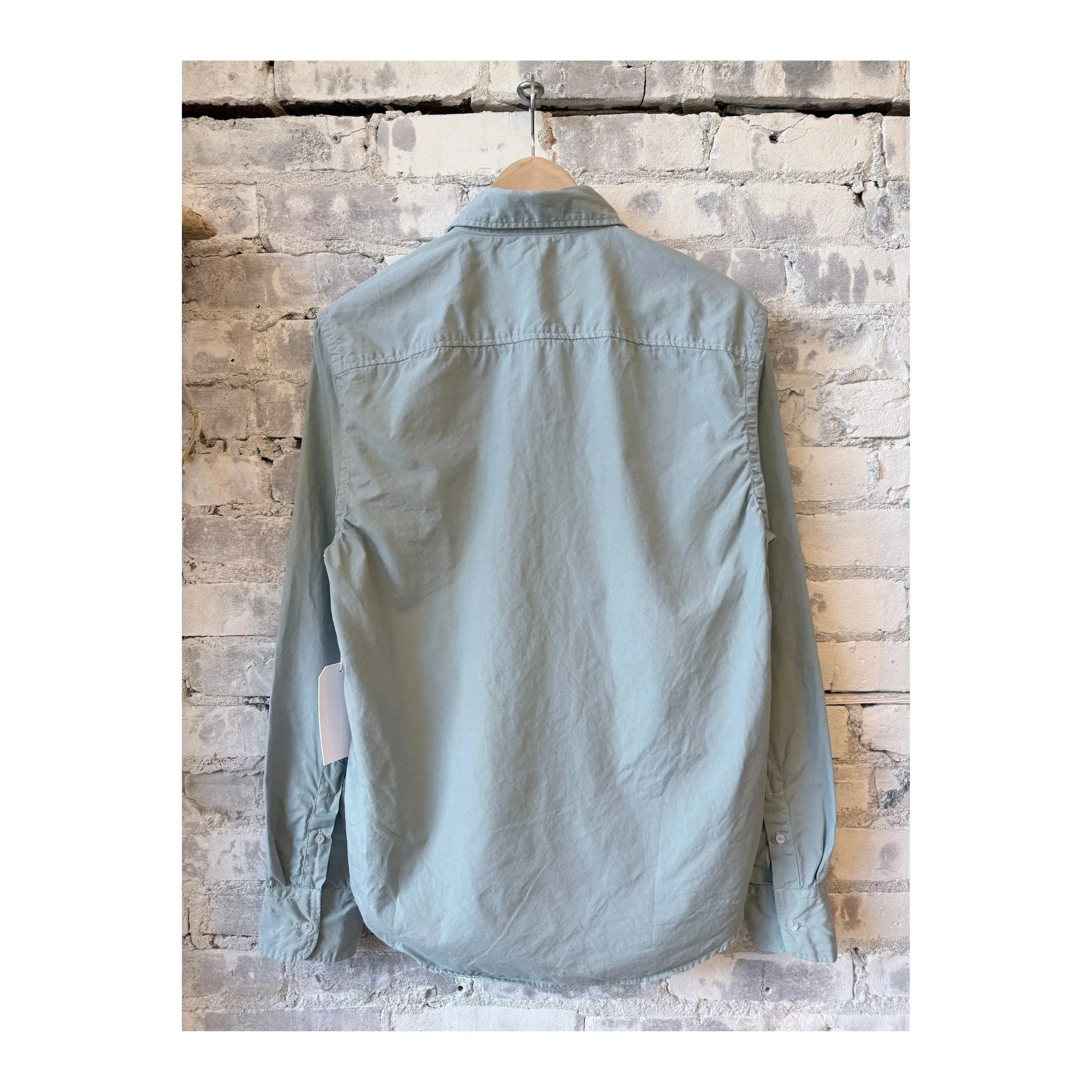 Men's poplin standard shirt in surf color by Save Khaki United, featuring a classic fit and button-down collar.