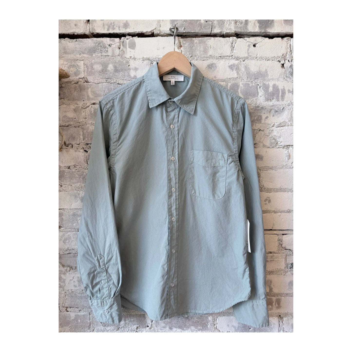 Men's Surf Poplin Standard Shirt by Save Khaki United, light blue with a classic collar and button-down front.