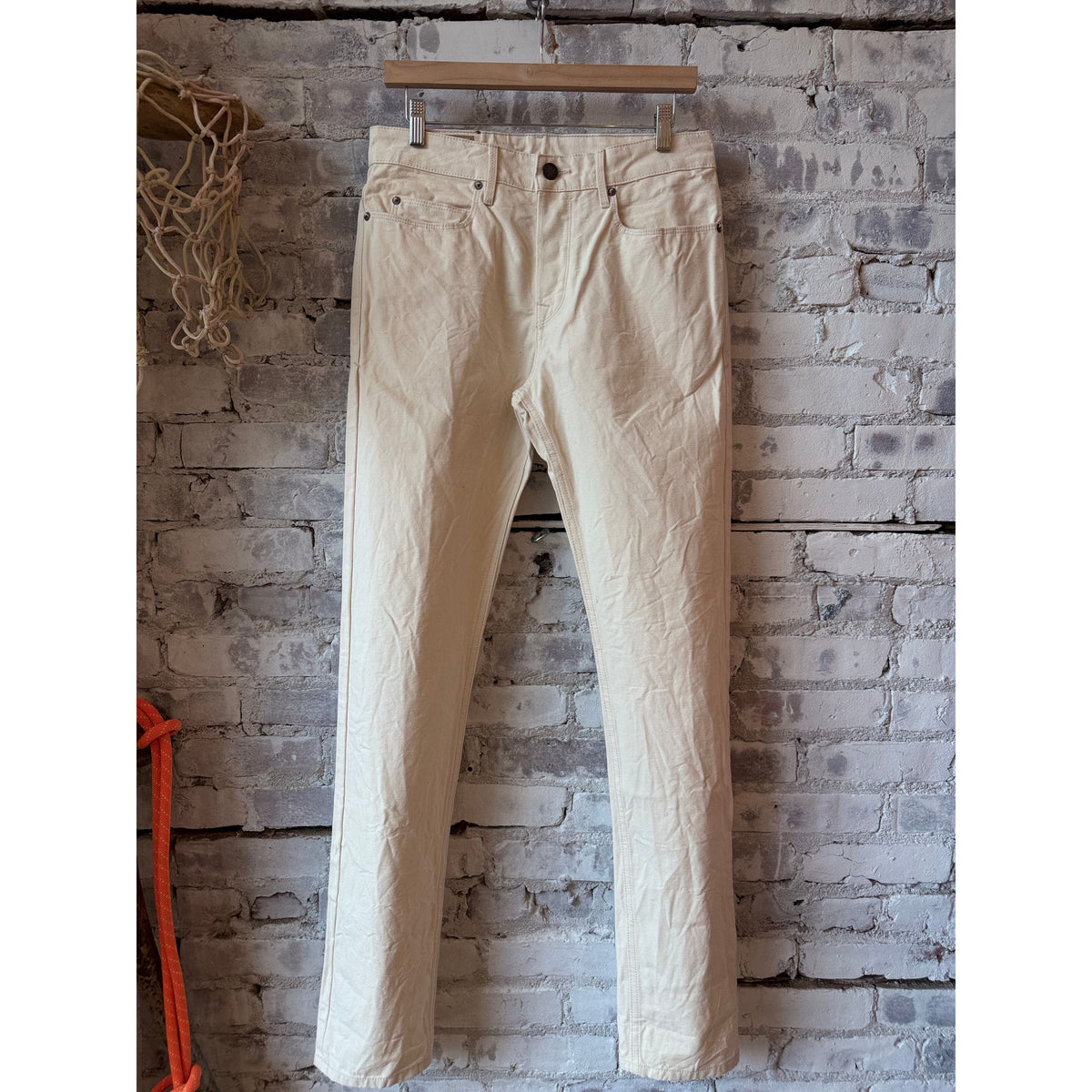 Men's Freenote Cloth Portola Classic Taper 11 oz denim pant in natural rinse, showing relaxed fit and subtle fading details.