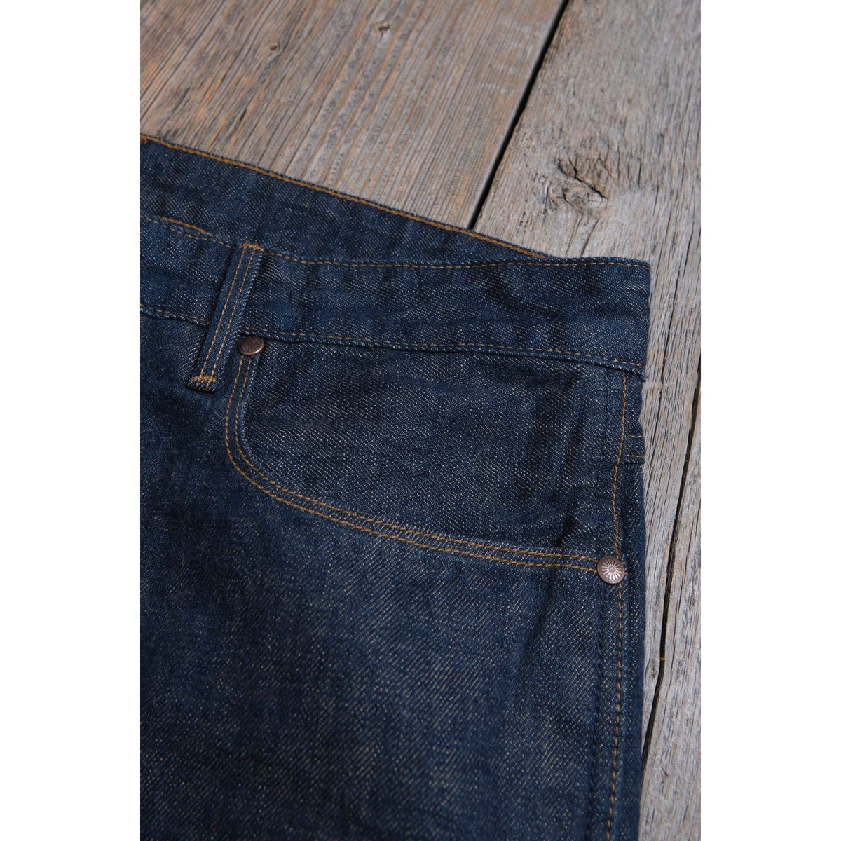 Men's Freenote Cloth Portola Classic Taper 13 oz denim jeans in natural rinse, showcasing the relaxed fit and detailed stitching.