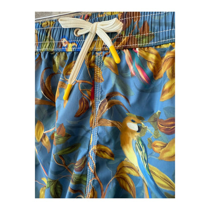 Men's printed swim trunks with a blue parrot design from Hartford Men's, featuring vibrant tropical bird patterns.