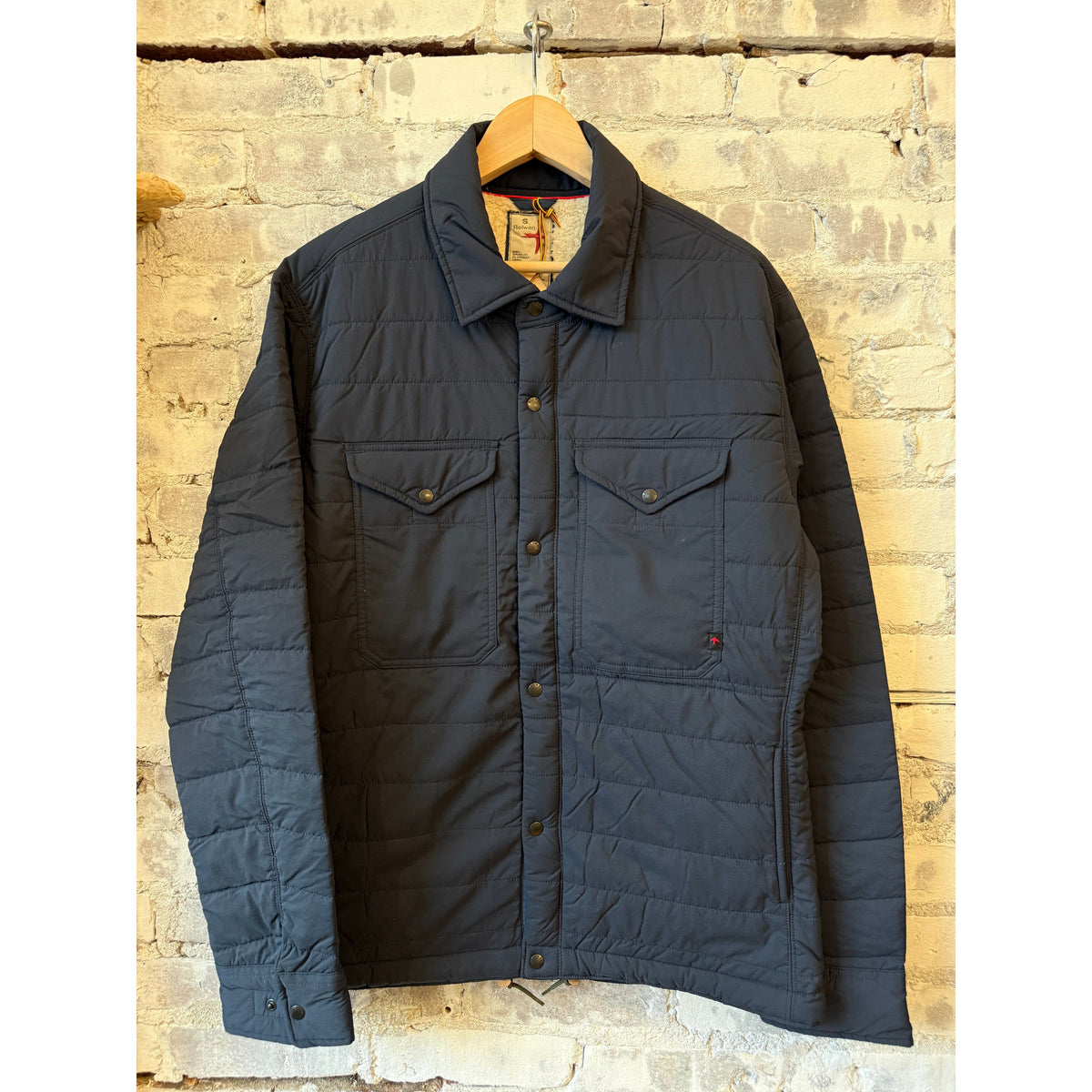 Men's navy Qltd Superfleece jacket by Relwen, featuring a cozy fleece fabric, full zipper, and stand collar for casual warmth.