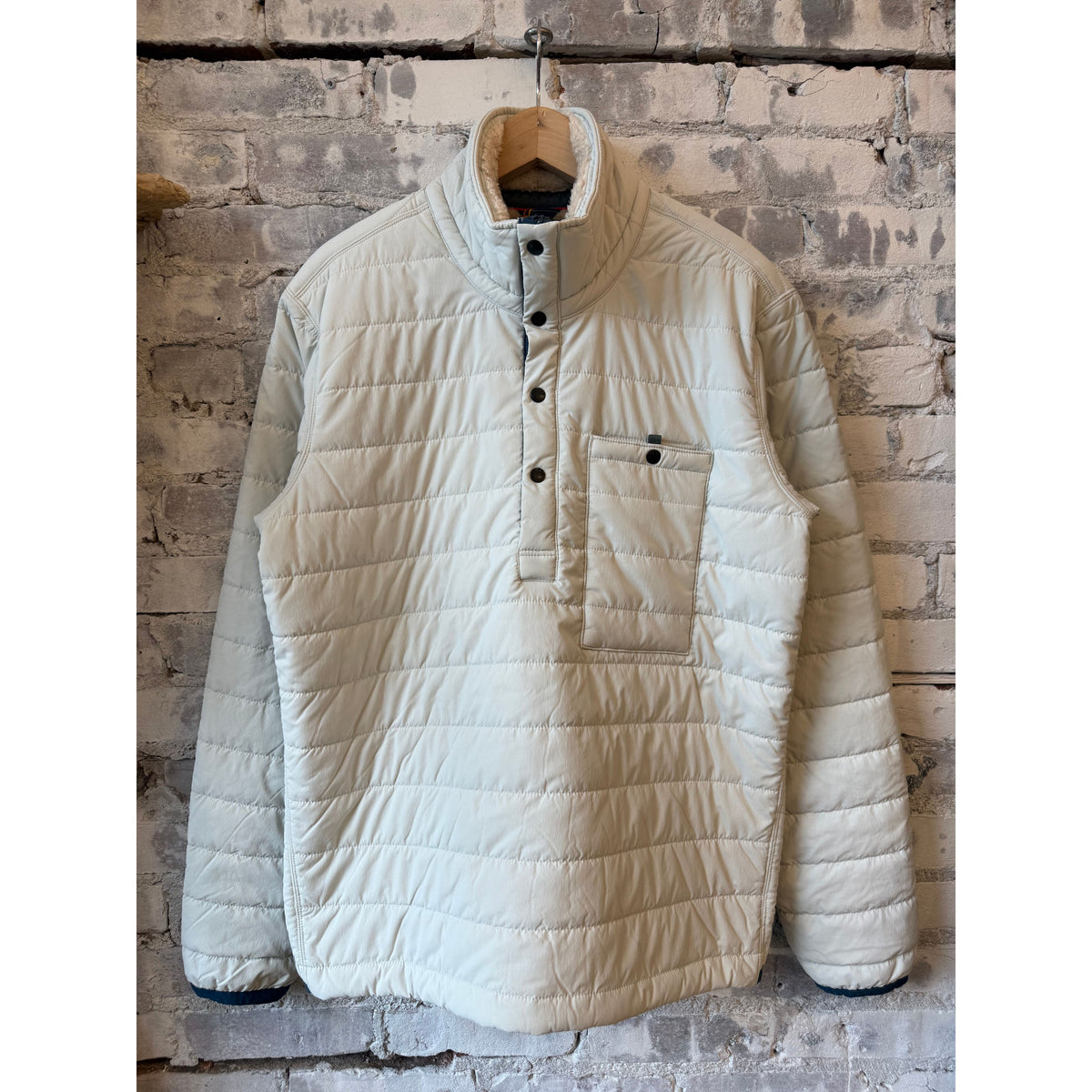 Men's Relwen Qltd Superfleece Popover in Chalk, showing the soft fleece fabric and relaxed fit with a front pocket.