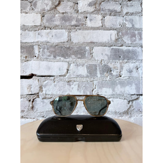 Men's American Optical Racer Pilot Glasses in honey-colored lenses, featuring a classic design with a sleek frame.