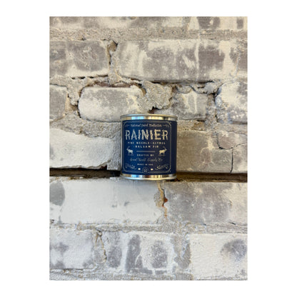 Rainier National Park scented candle by Good & Well Supply Co. featuring a scenic mountain design on the candle jar.