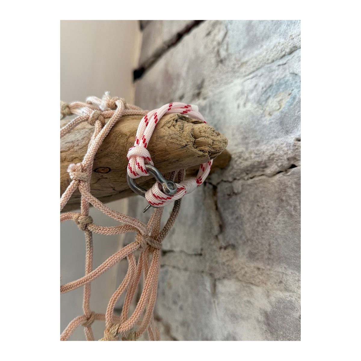 Men's Red Stripe Nautical Shackle Bracelet by Mystic Knotworks featuring red and white striped cord with metal shackle detail.