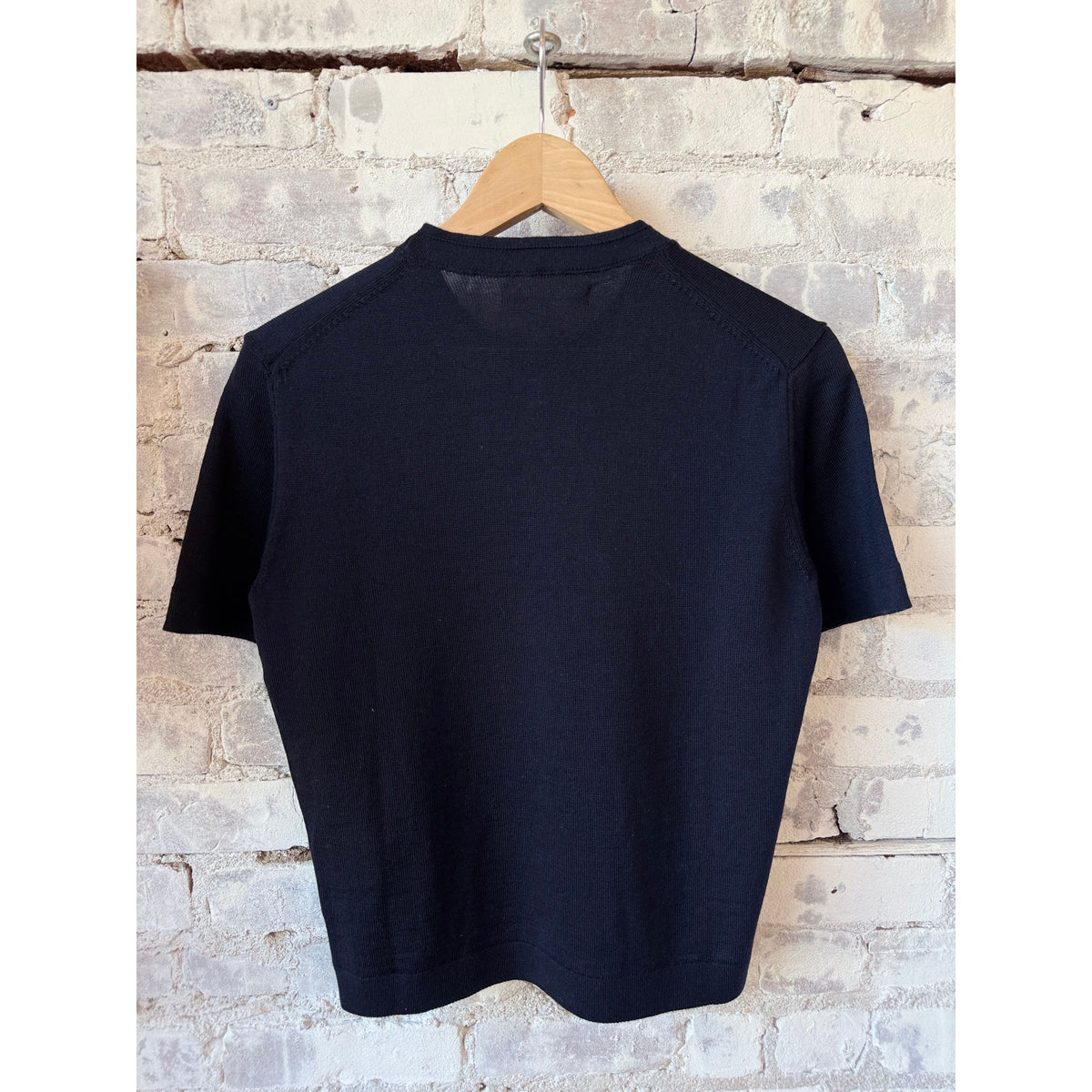 Dark navy women's short sleeve T-shirt made from refined Merino wool by Merz B. Schwanen, showcasing soft fabric and classic fit.