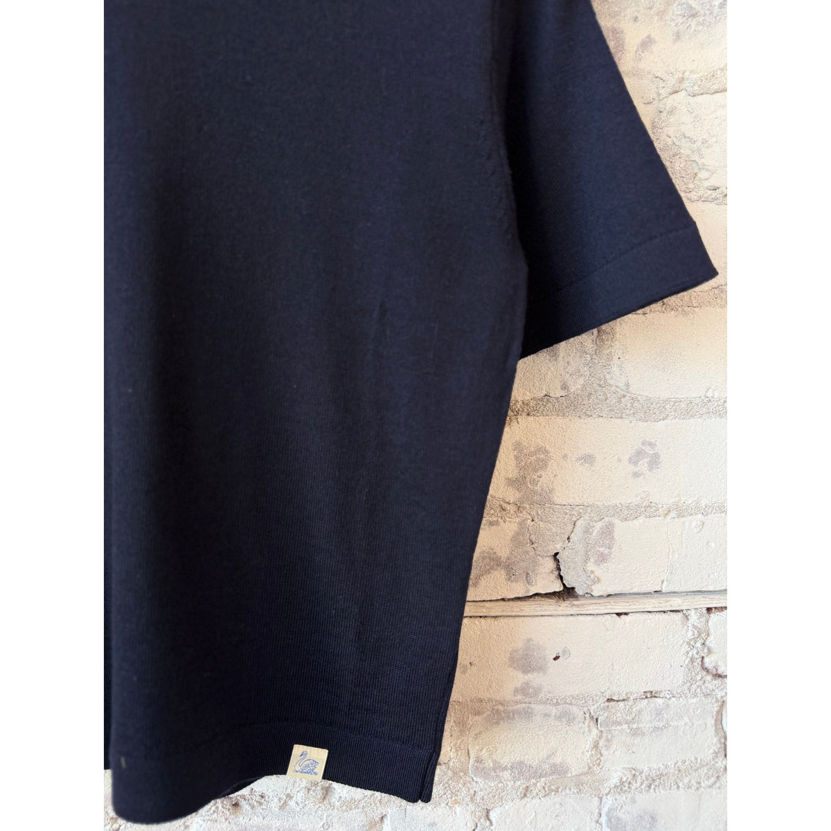 Dark navy women's Merz B. Schwanen refined merino wool short sleeve t-shirt, close-up of soft, fitted fabric.