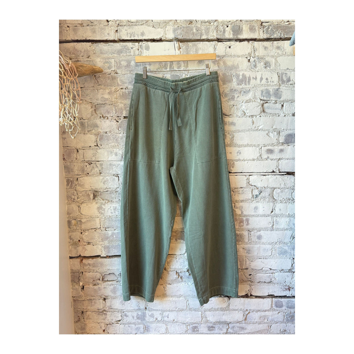 Men's Reformer Twill Jersey Pants in Forest Green by Eat Dust, showing the relaxed fit and durable twill fabric.