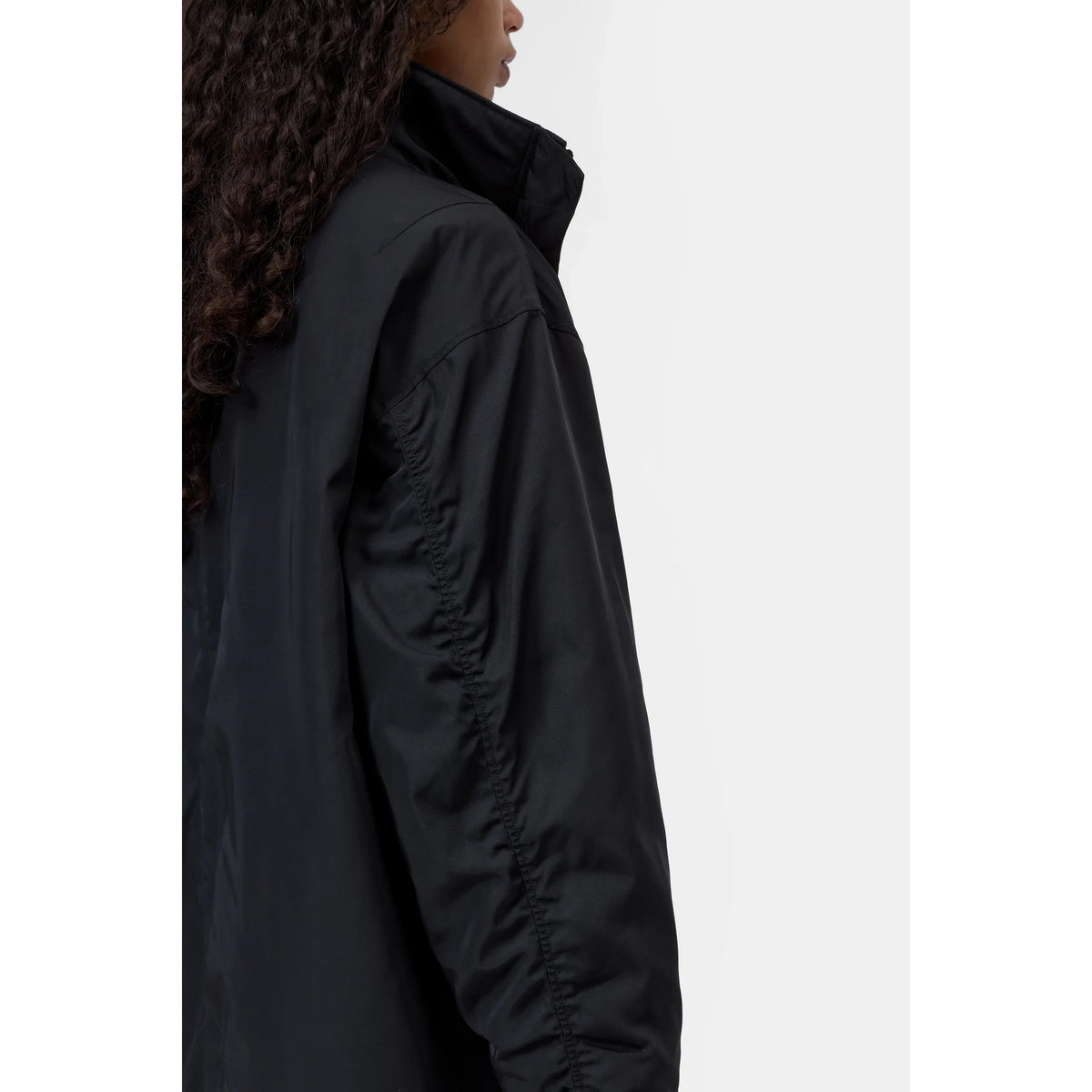 Women's black Relaxed Parka by Closed, showing a casual, loose-fitting outerwear jacket with a hood and relaxed style.