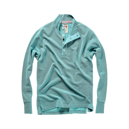 Men's Pique Button Mock in Ocean Heather by Relwen, close-up of textured fabric and button details on a casual men's shirt.