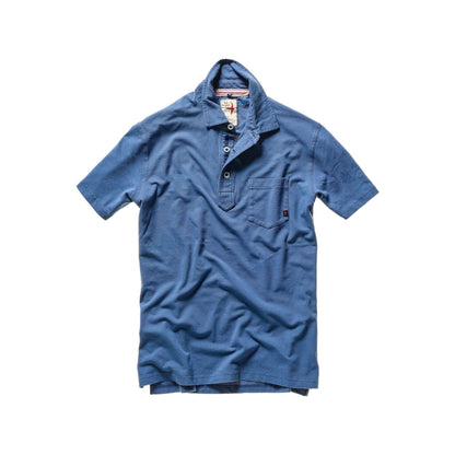 Men's marine blue pique slot polo shirt by Relwen, laid flat showing the classic fit and textured fabric.