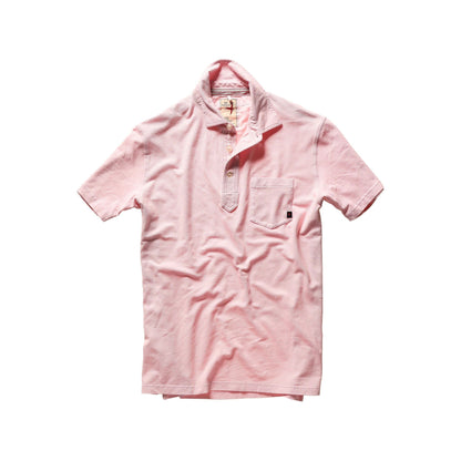 Men's pale pink pique slot polo shirt by Relwen, showing the textured fabric and classic collar style.