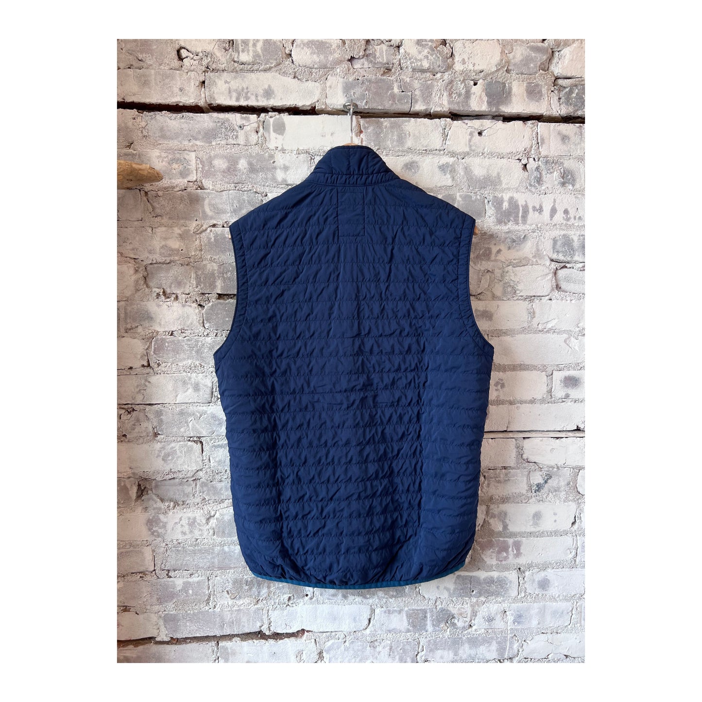Men's Windzip Vest in Bright Navy by Relwen, showing the lightweight, windproof design with front zip and stand collar.