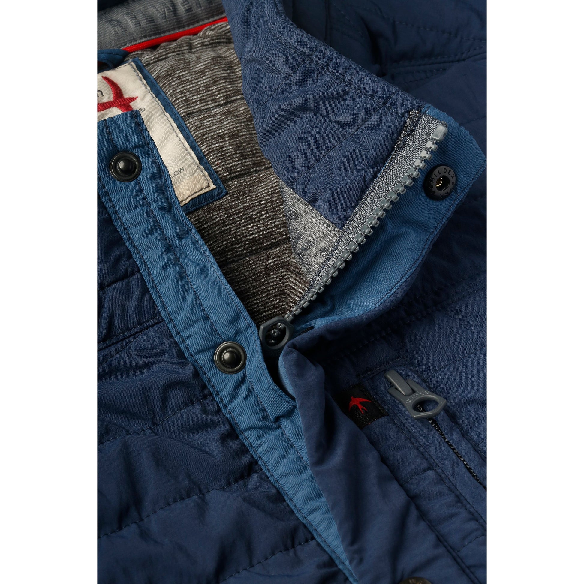 Men's Windzip Vest by Relwen in bright navy, showing the front view with zipper closure and lightweight fabric.